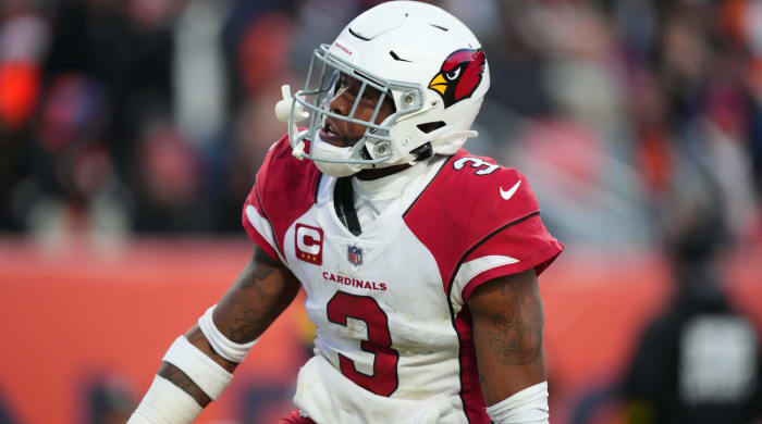 Dec 18, 2022; Denver, Colorado, USA; Arizona Cardinals safety Budda Baker (3) reacts to his interception in the second half against the Denver Broncos at Empower Field at Mile High. Mandatory Credit: Ron Chenoy-USA TODAY Sports